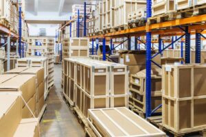 "Rows of shelves filled with stock – Trusted UK wholesale supplier for Amazon FBA and retail businesses."